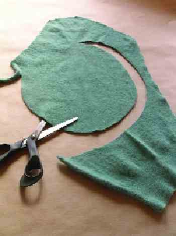 STEP 3: Trace around a dinner plate with a pen or colored pencil. The average sweater will yield four large circles, one each from the front, back, and both sleeves. A cardigan will probably only yield three, a vest two.